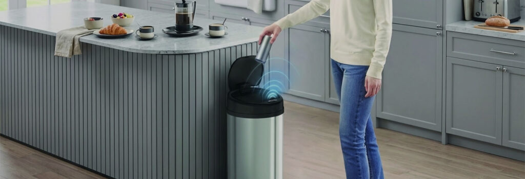 Smart sensor trash can in a modern kitchen setting for hygienic waste management